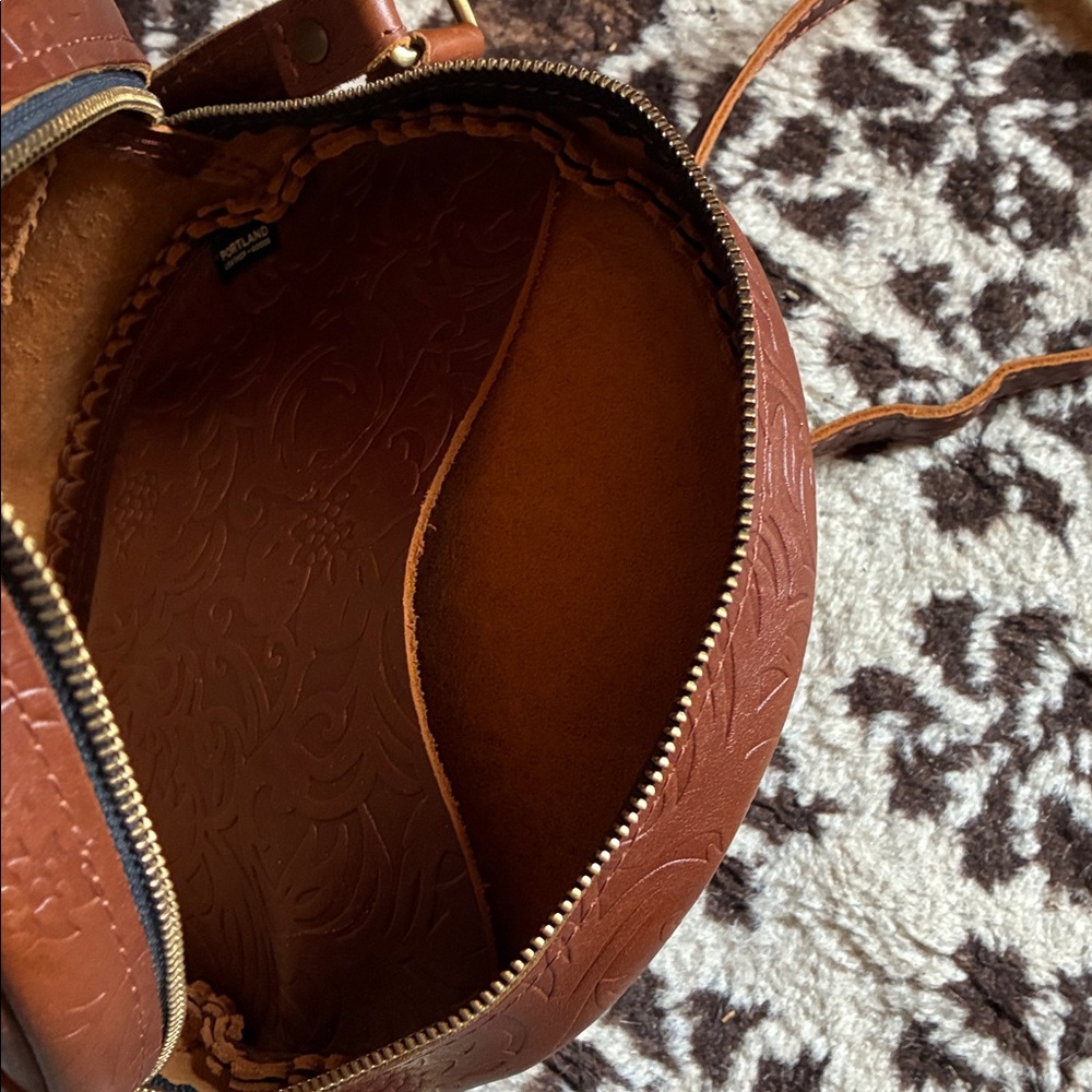 Portland Leather Round Tooled Crossbody Bag in Cognac Brown - Picture 9 of 9